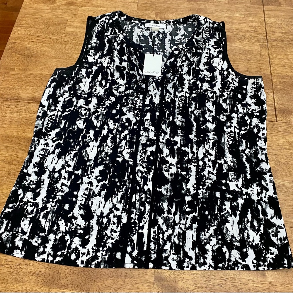 Calvin Klein women’s sleeveless blouse.